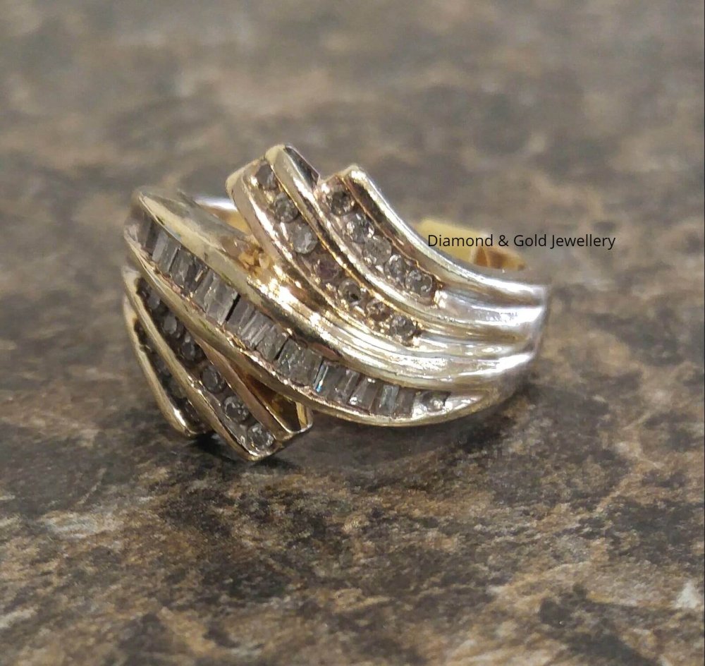 10k ring with round and baguette diamonds