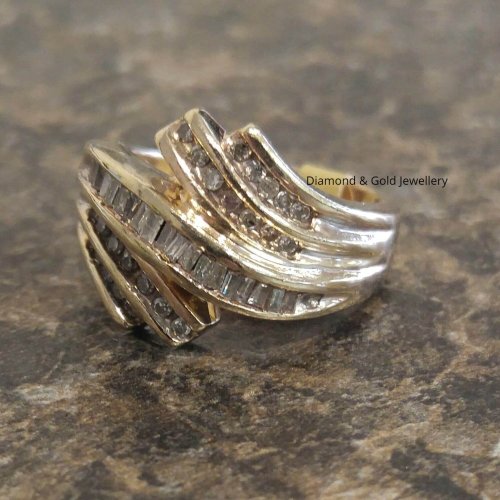 10k ring with round and baguette diamonds