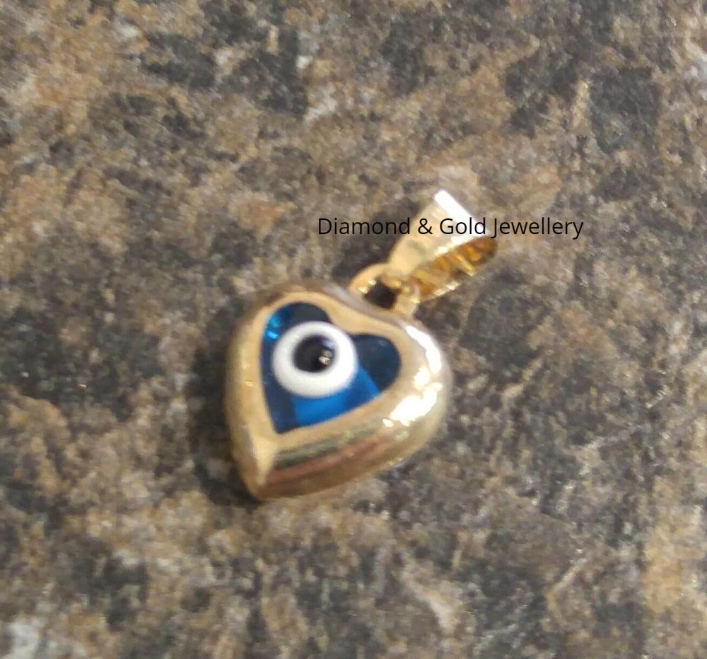 10k Eye Pendant in a Heart