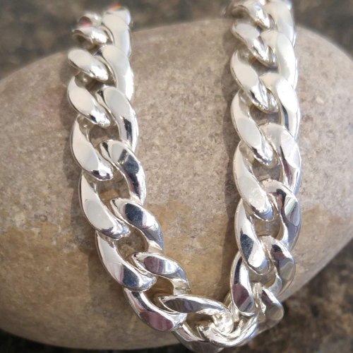 Cuban link styled silver bracelet.